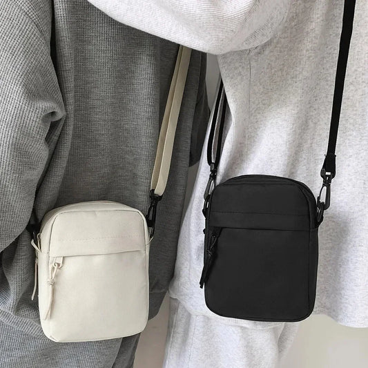 Bolso bandolera de lona para mujer, tendencia 2024, estilo Oxford, bolso de hombro coreano de color liso, bolso para teléfono para estudiantes, bolso de compras sencillo.